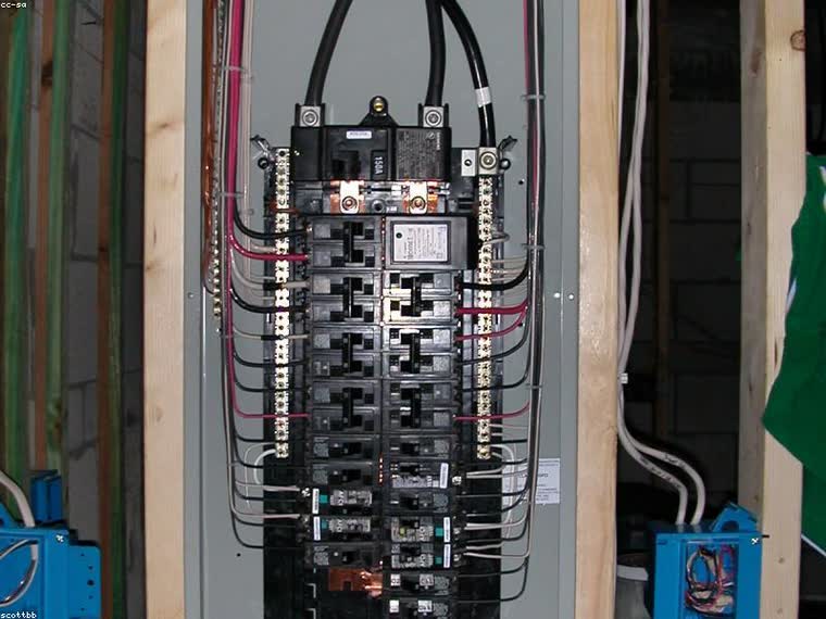 Open electrical panel with neatly labeled circuits